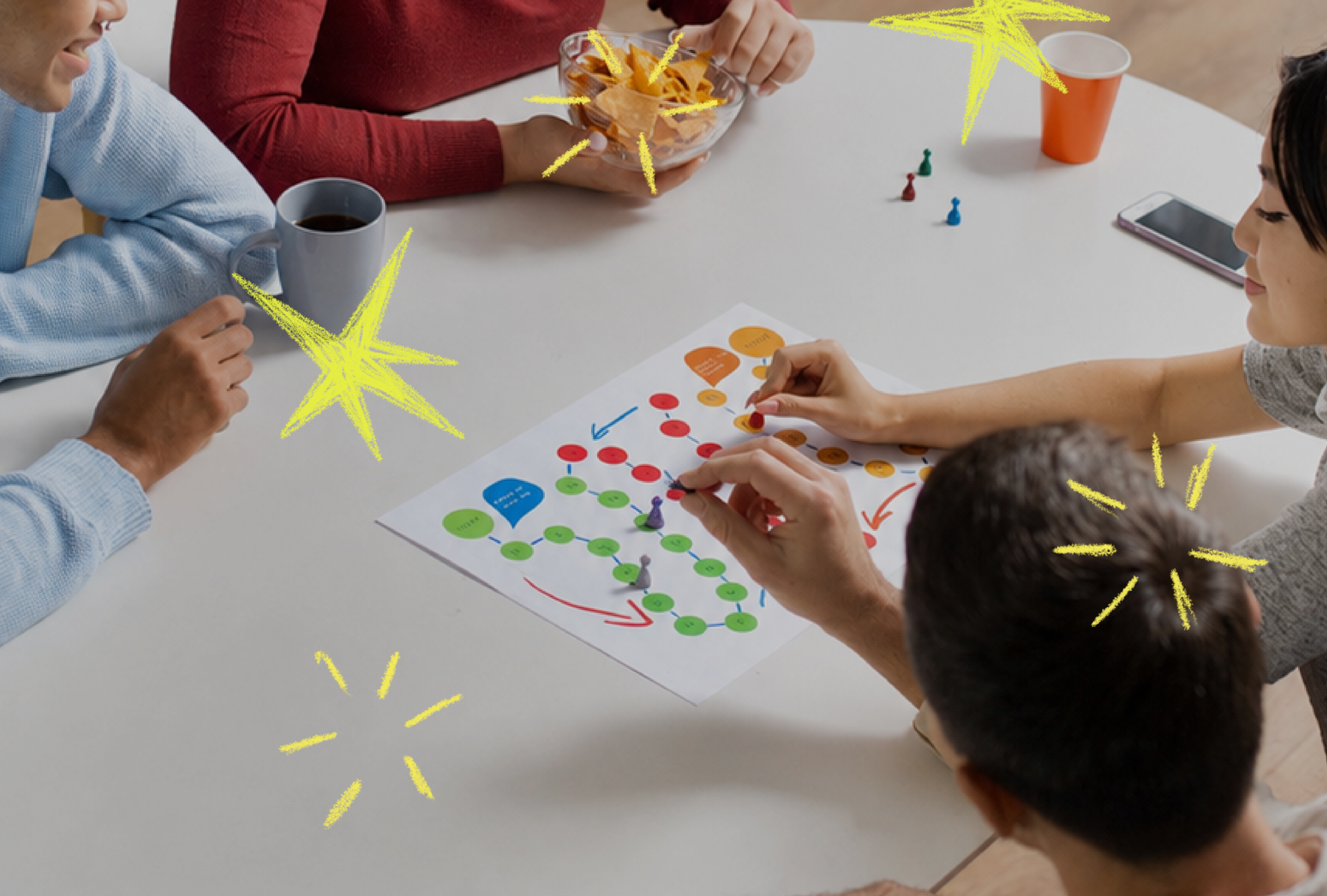 Giovani riuniti intorno a un tavolo partecipano a un gioco sulla partecipazione, tra pedine, idee e momenti di confronto.